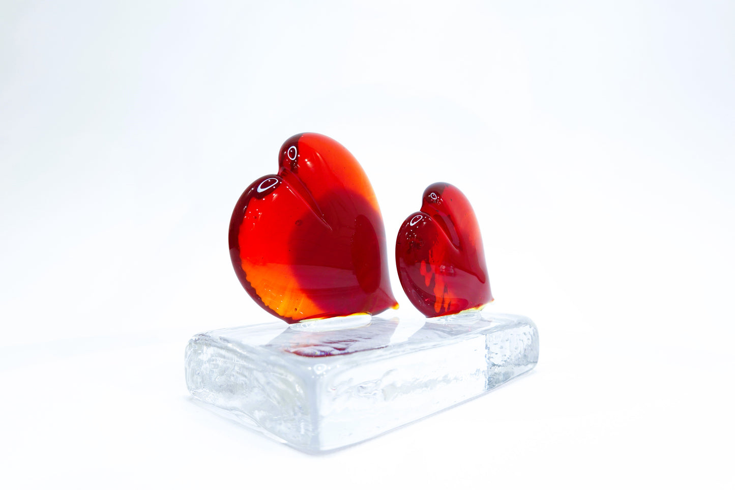 Two Hearts in Murano Glass on a Transparent Base - Two Hearts